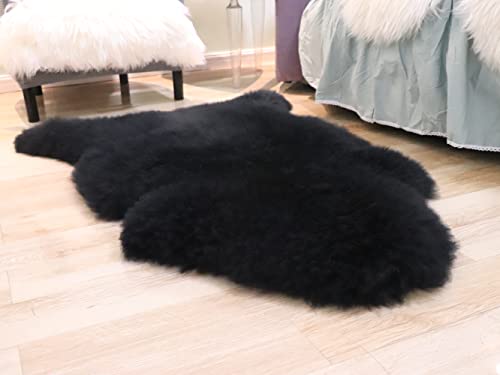 Black Woolous sheepskin rug showing dense natural wool that can last for years with proper care.