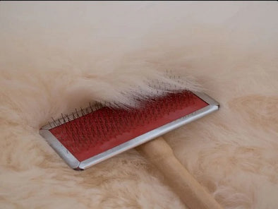 How to brush sheepskin rug?